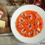 Spaghetti con baccalà, olive, pomodorino giallo e polvere di capperi