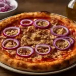 Pizza siciliana con acciughe e cipolle: ricetta facile da preparare a casa